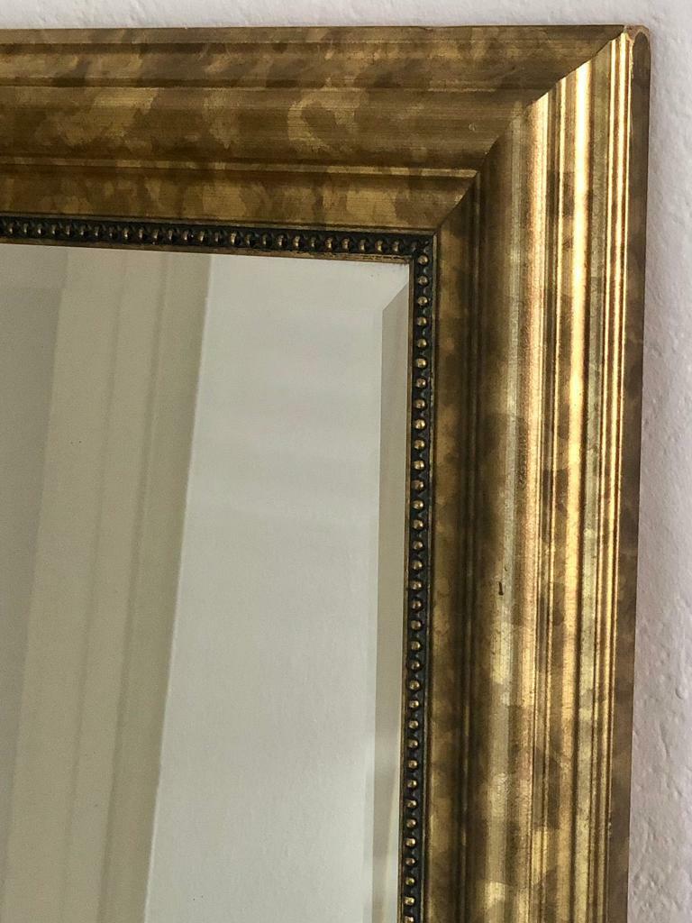 Mirror on heavy golden framed 140,5x 50,5 in cm