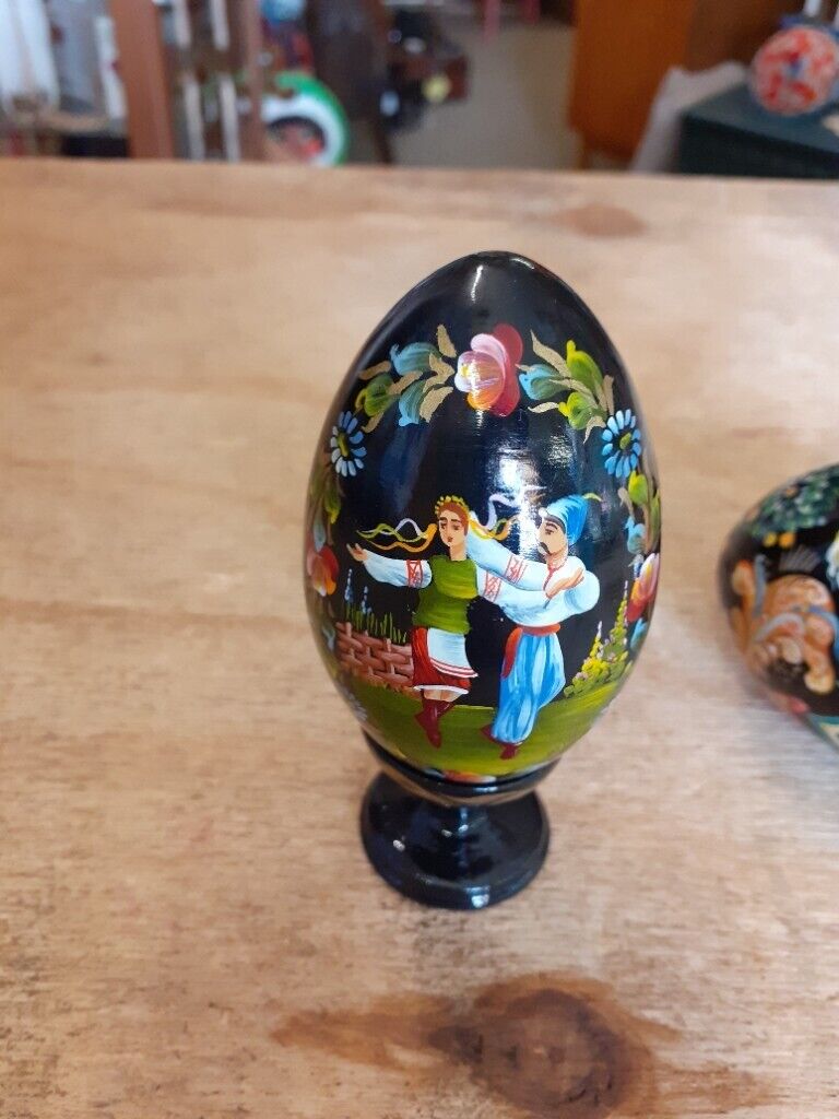 Vintage hand painted wooden egg with stand. Lacquered.
