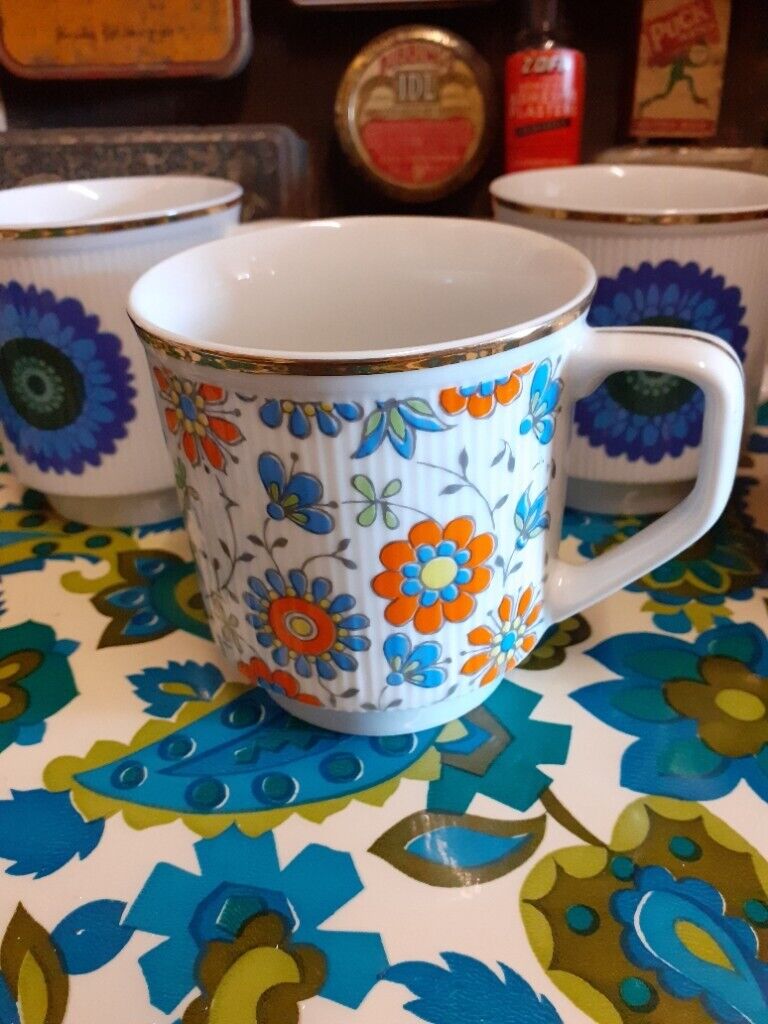 Unused retro mugs. Has gold coloured edging. Made in poland.
