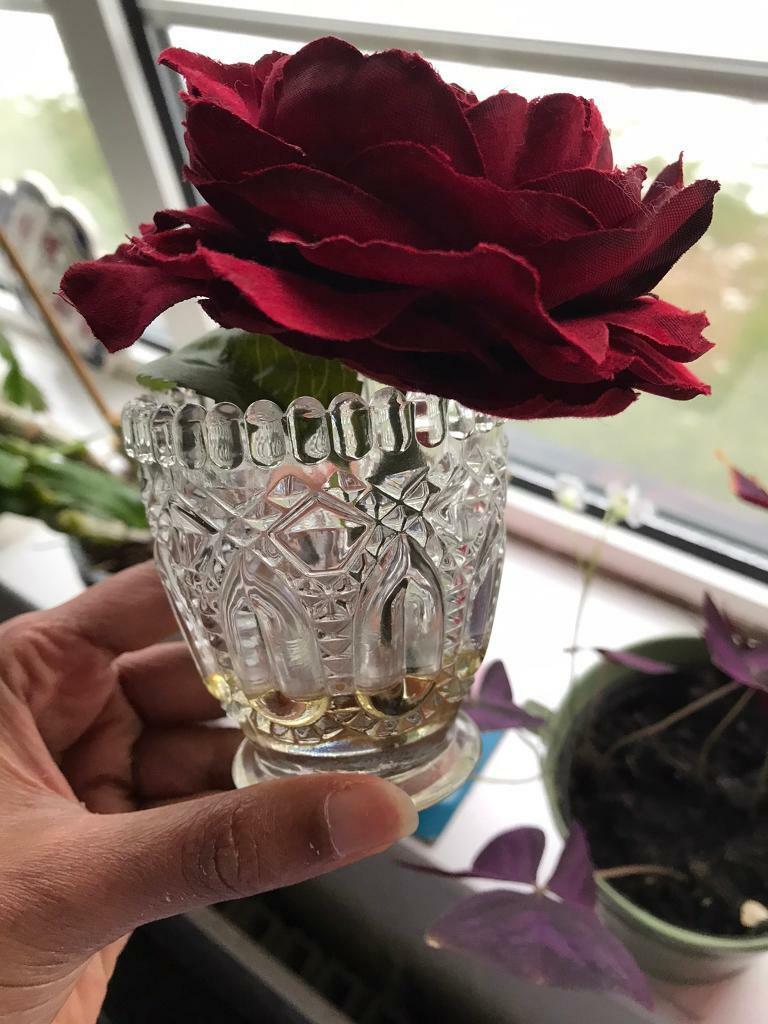 Small vase with red rose 