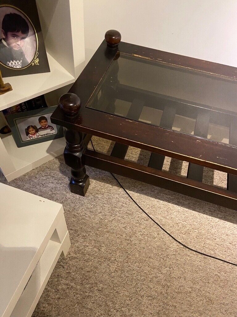 Hard wood table with glass 