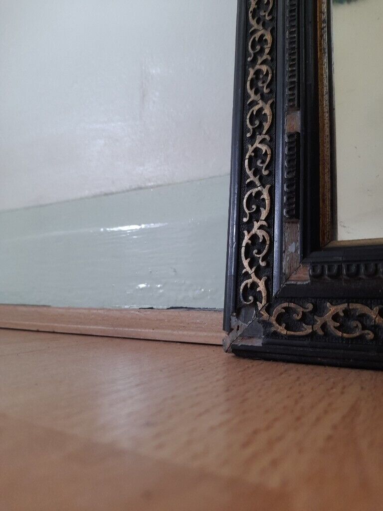 Mirror with decorative frame