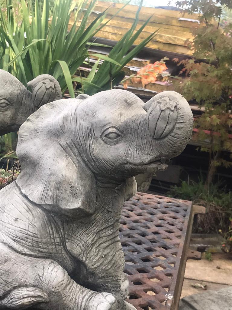 Sleeping puppy garden statue