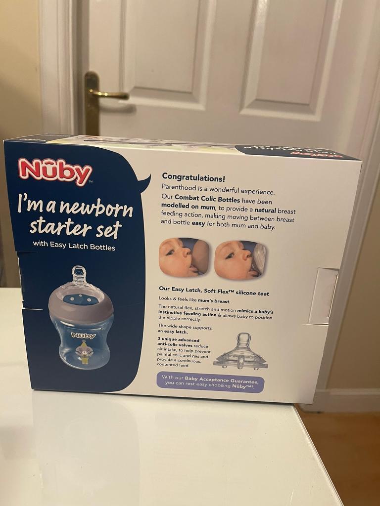 New in box, unopened Nuby Natural Touch newborn starter set