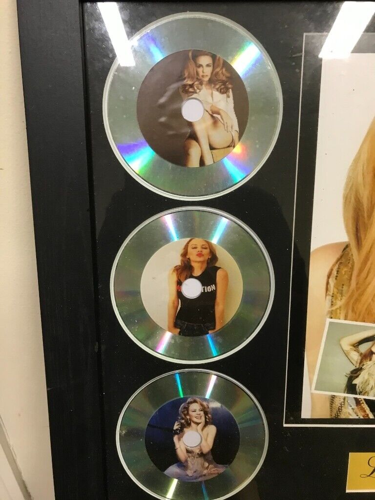 KYLIE MINOGUE LEGENDS OF MUSIC CD AND PRINT IN BLACK FRAME