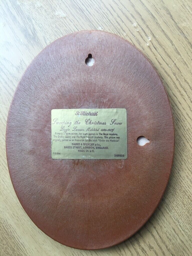 Vintage oval framed paining by Lizzie Lawson. Sweeping the Christmas snow.