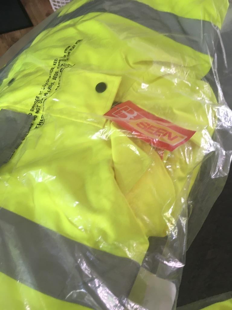 image for Hi vis jacket plus two polo tops n hard hat n glasses 