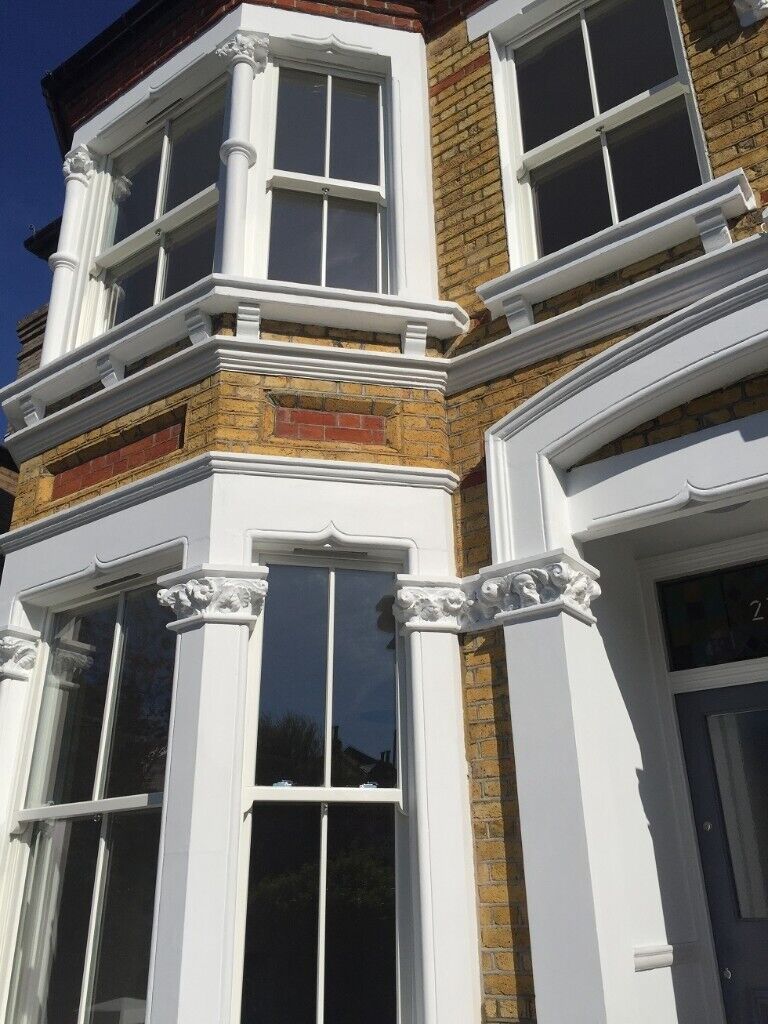 Traditional wooden sash window with key