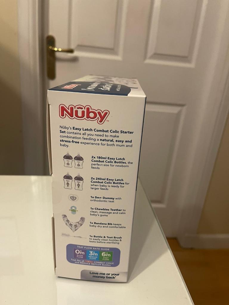 New in box, unopened Nuby Natural Touch newborn starter set
