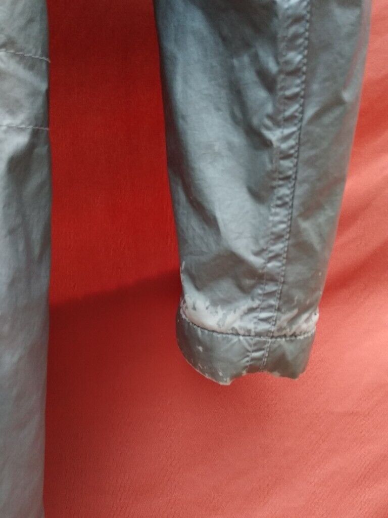 Bargain Coat Age c. 10. Silver (reflects); fur-edge hood; pockets galore!
