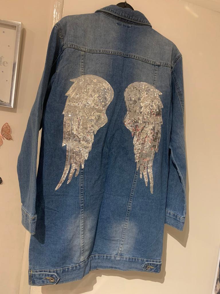 Ladies denim jacket size small angel wings on the back