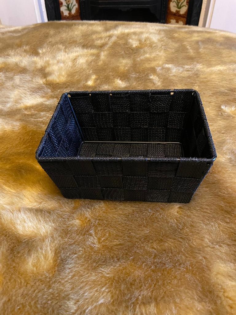 image for 17 black metal and fabric small baskets 
