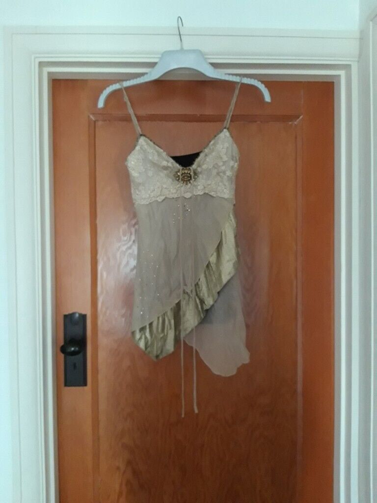 Ladies party/ occasion top. black back, gold front.  Size 10. as new