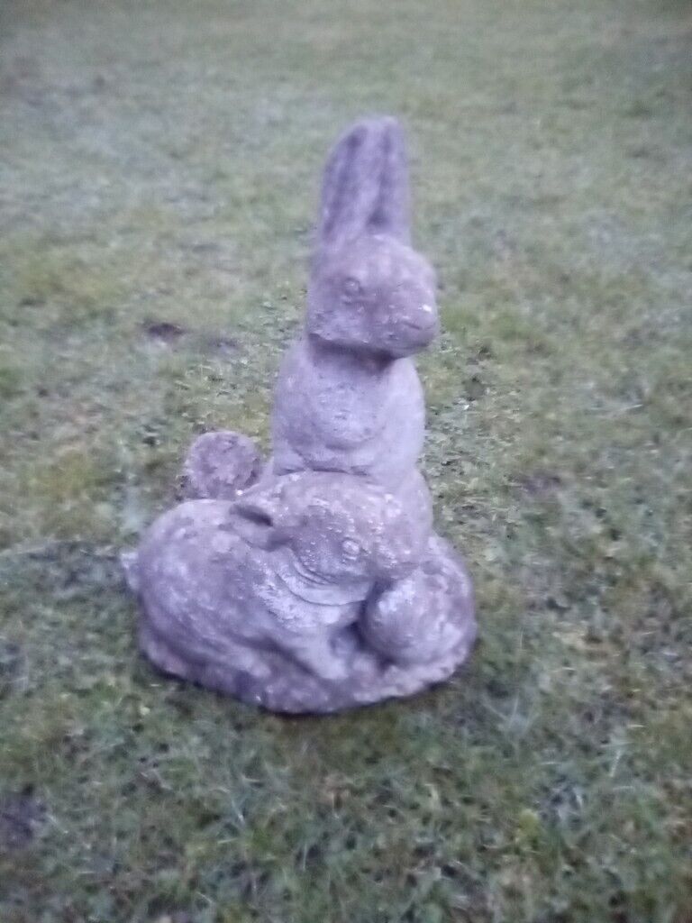 image for Family of Rabbits in Stone. Condition is very good. Can deliver locally.