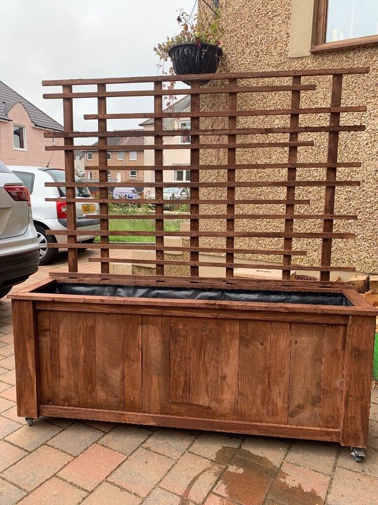 image for Handmade Wooden Flower/Plant/Vegetable Planter trellis & castor wheels
