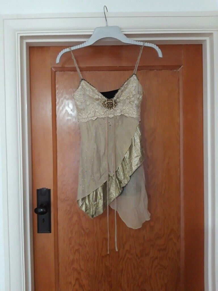 Ladies party/ occasion top. black back, gold front.  Size 10. as new