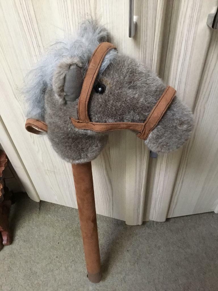 image for UNUSUAL MUSICAL HOBBY HORSE 