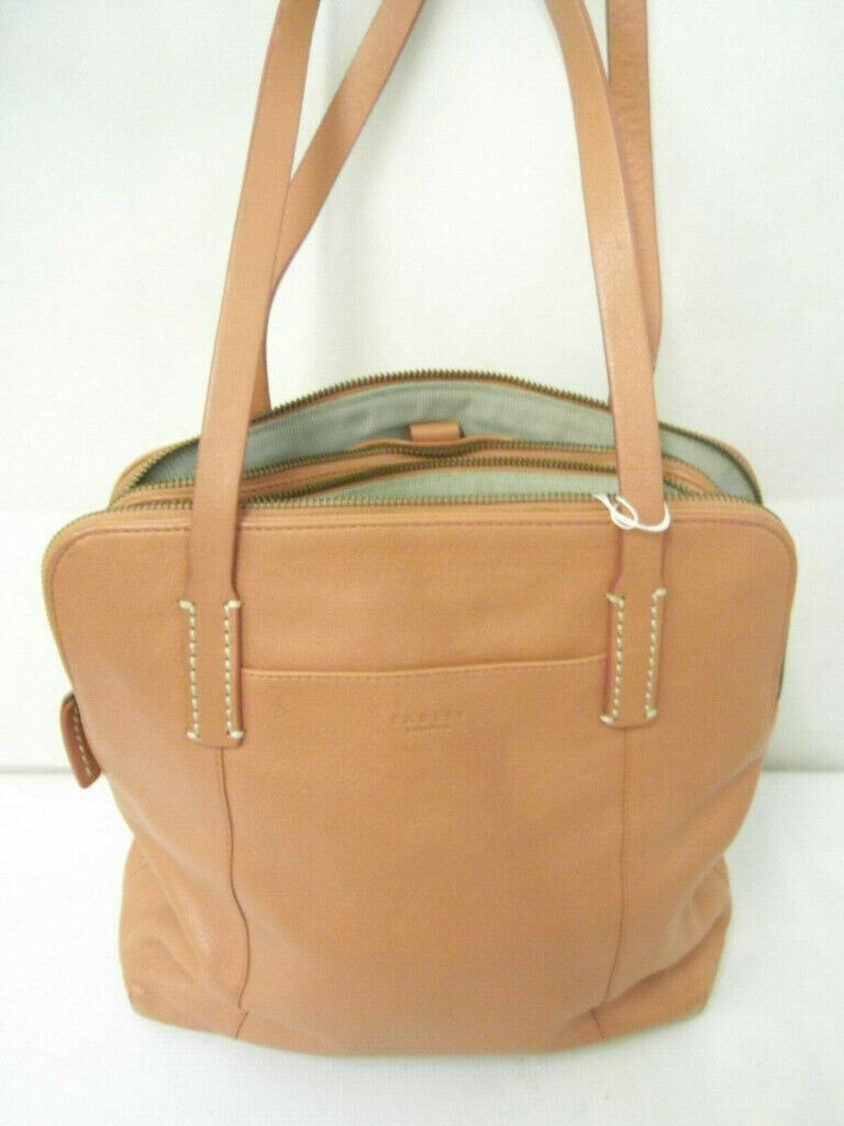 image for RADLEY Ladies handbag coral coloured leather shoulder bag with dog bag charm,Very good condition.