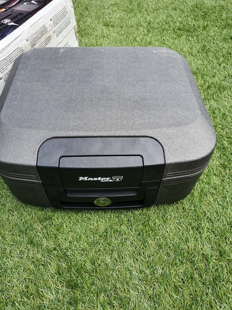  Master lock fire and flood security Chest  No keys with it as a small crack on the bottom see pics