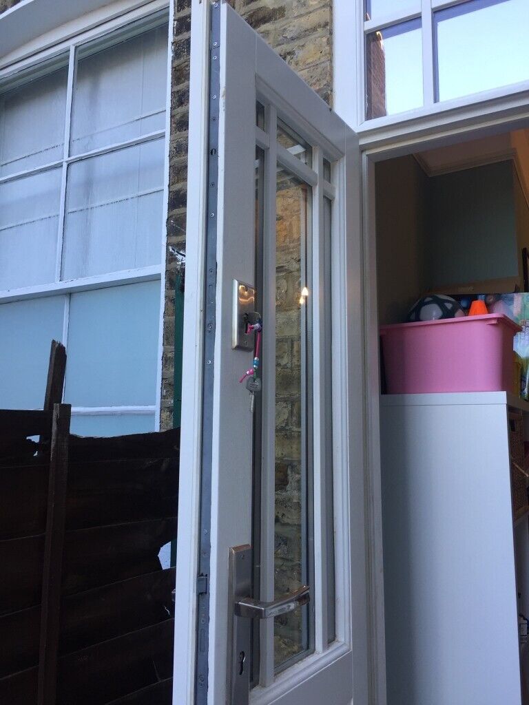 Traditional wooden sash window with key