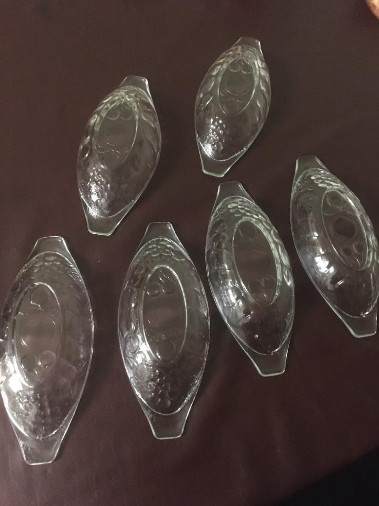 image for SIX OF LIKE BOAT SHAPED PLATES .