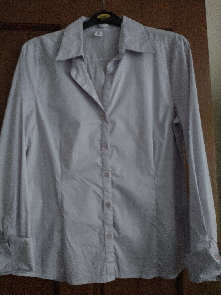  SHIRTS (H&M) SIZE 14. Two - Pale lilac & pale blue. Both in new condition.