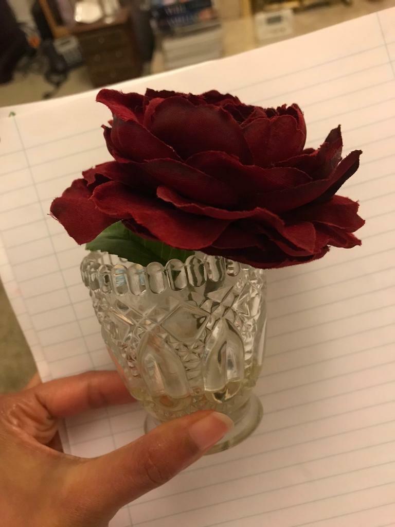 Small vase with red rose 
