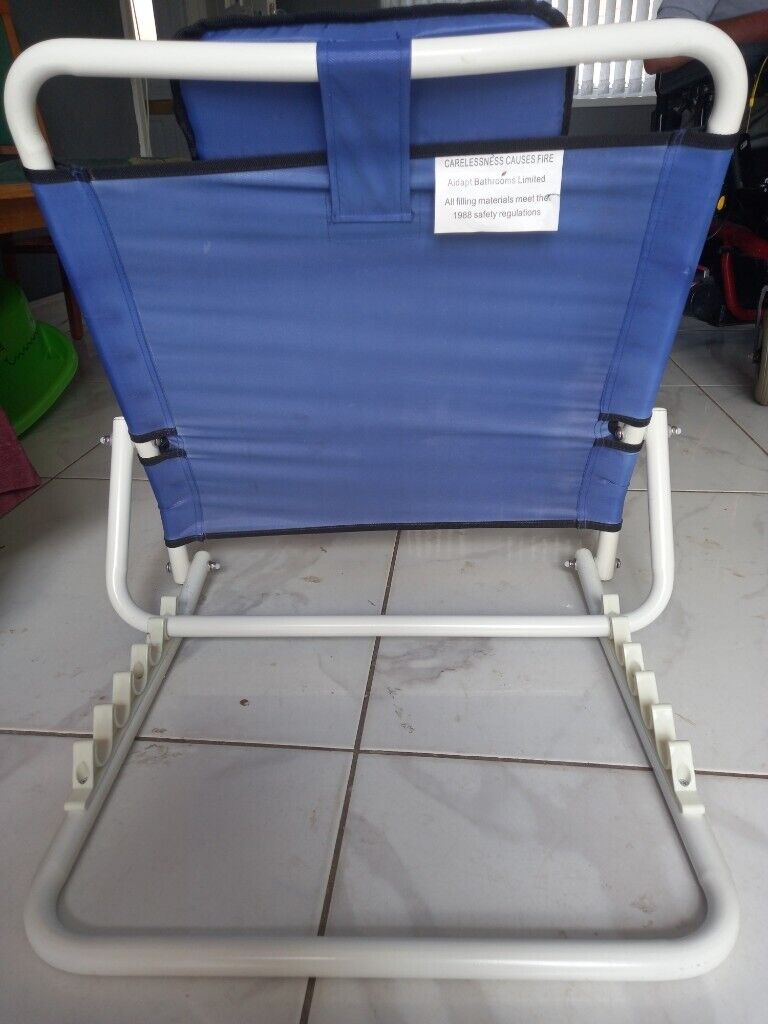 Adjustable back rest with multiple uses