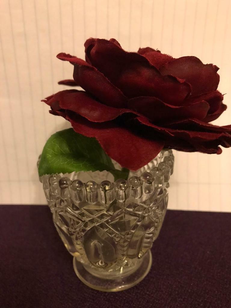 Small vase with red rose 