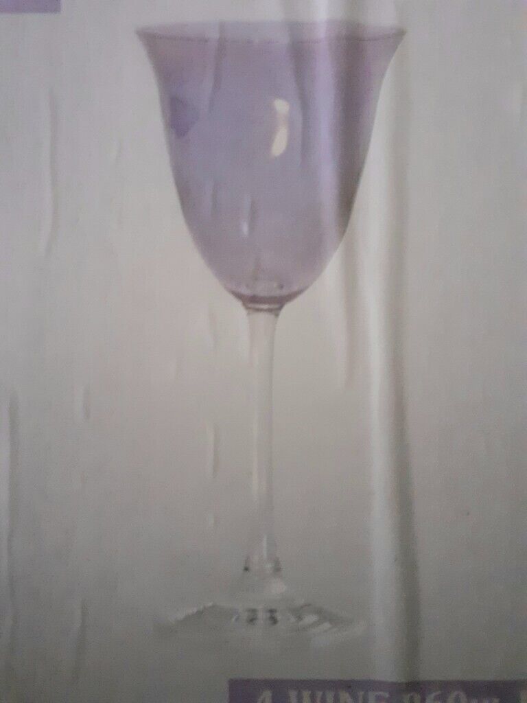  Goblet shaped tinted wine glasses,
