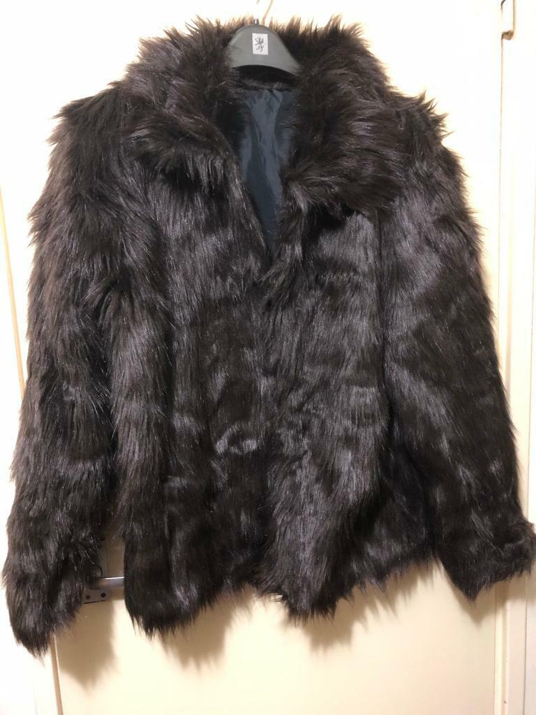 image for Women’s fluffy warm coat size 14/16