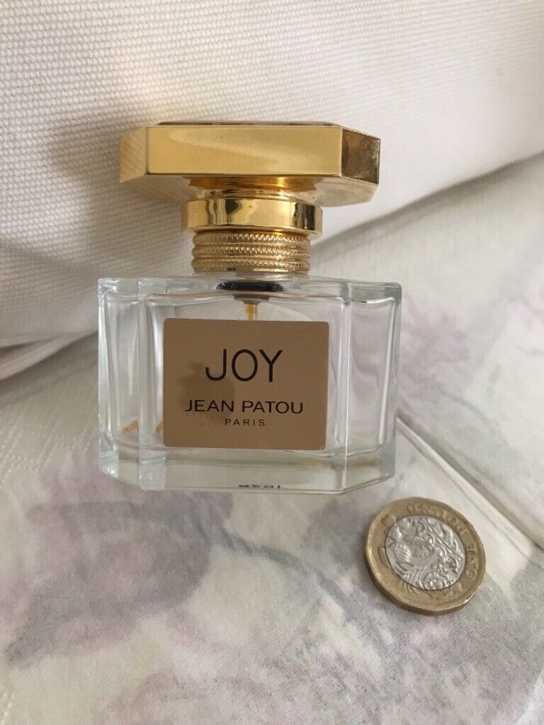 Perfume bottles- empty Patou’s Joy & Dana’s Tabu  - 1/4 full. Also “ fracas “ bottles.