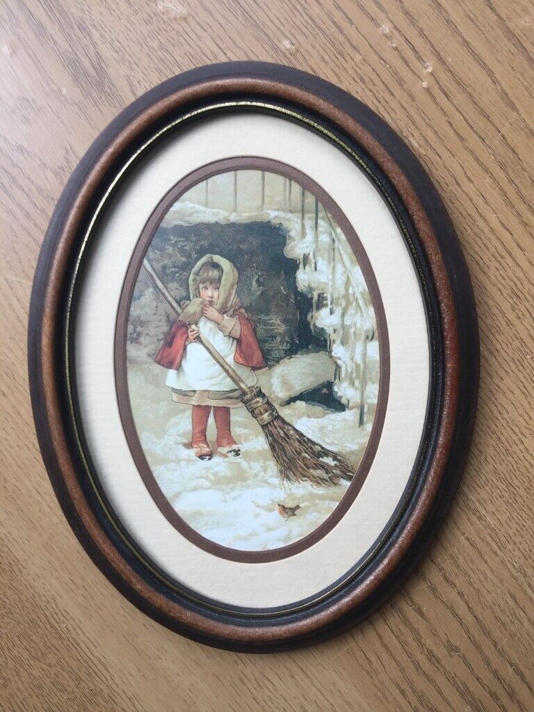 image for Vintage oval framed paining by Lizzie Lawson. Sweeping the Christmas snow.