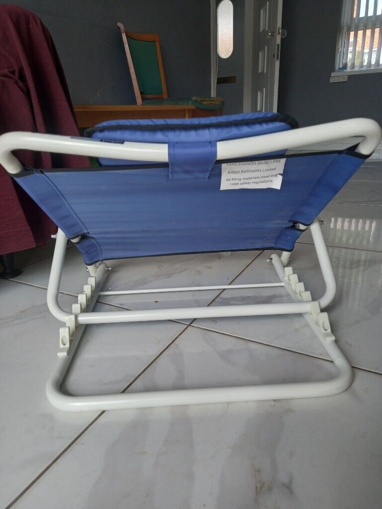 Adjustable back rest with multiple uses