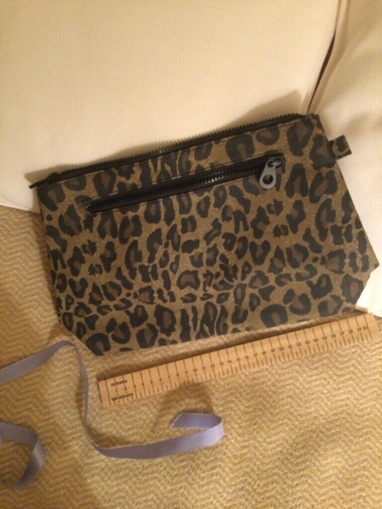 image for Toilet Bag (  unisex ) Animal print. Mauve lining.New.