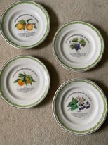 Set of four pretty French ceramic plates 