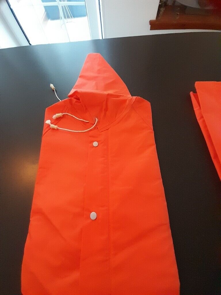 NEW,UNUSED 2 piece HEAVY DUTY waterproof SLICKER SUIT, size SMALL