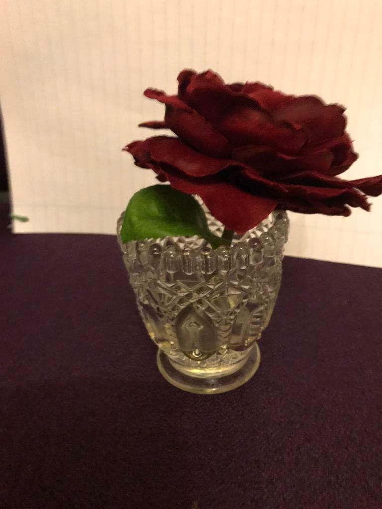 Small vase with red rose 
