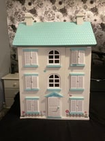 Wooden Dolls House. 3 feet high with furniture.