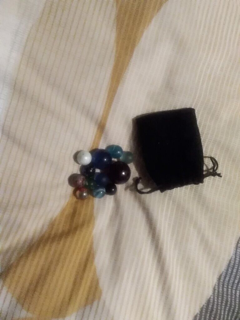 image for 12 very collectible marbles and pouch few rare ones