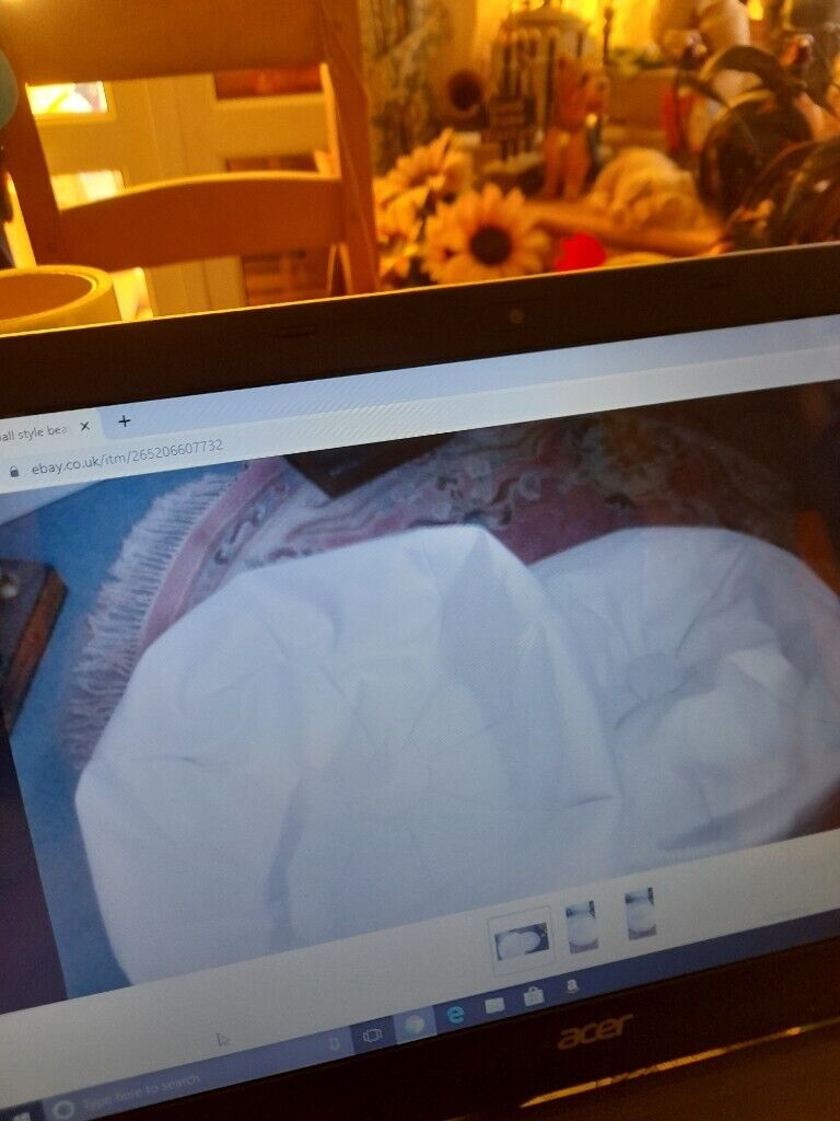 A Large White Football Bean Bag Pouffe