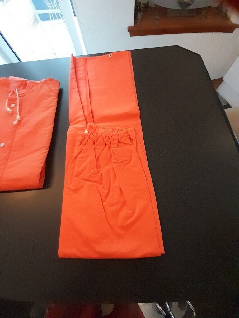 NEW,UNUSED 2 piece HEAVY DUTY waterproof SLICKER SUIT, size SMALL