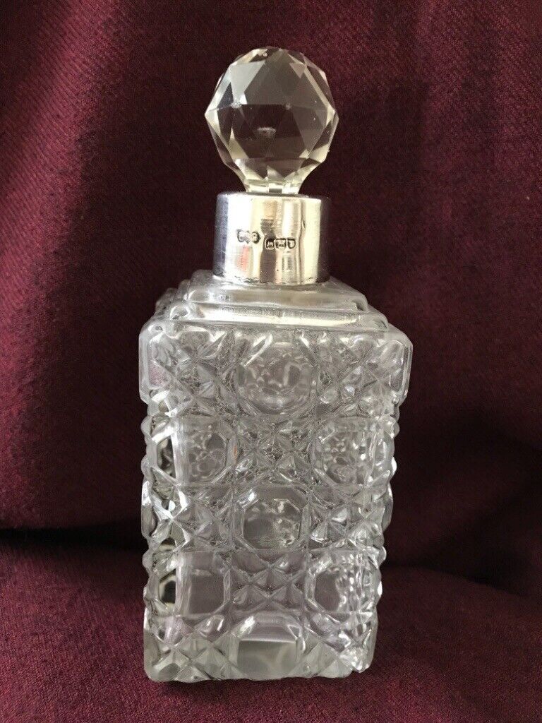 image for Antique cut glass perfume bottle with sterling silver collar