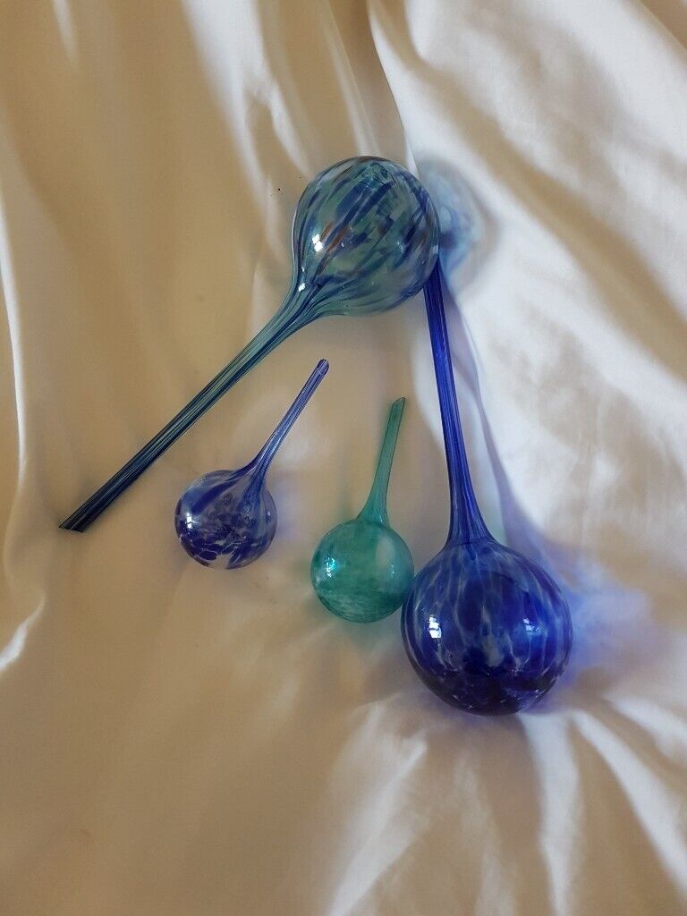 image for 4 glass plant minders 