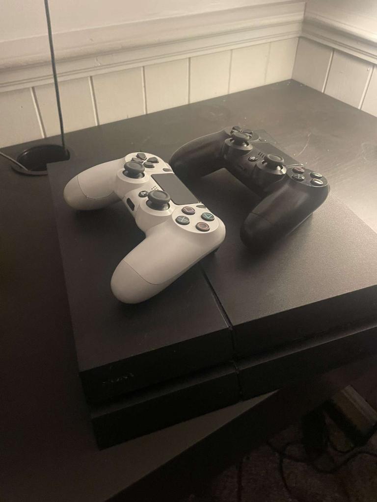 PlayStation 4 - with 2 controllers 