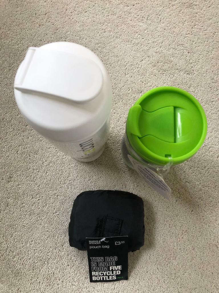 A Smart Travel Mug, White water bottle, Marks & Spencer pouch bag.