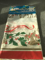 Christmas plastic Table cover (New and factory sealed) Size 140cm X 180cm