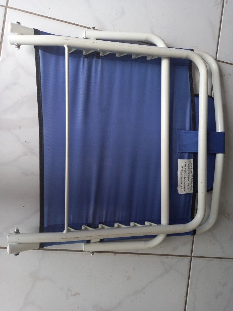 Adjustable back rest with multiple uses