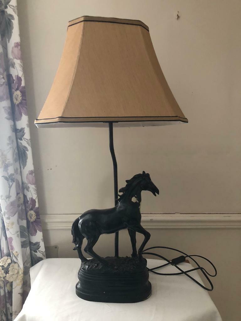 New unused horse lamp with lampshade.