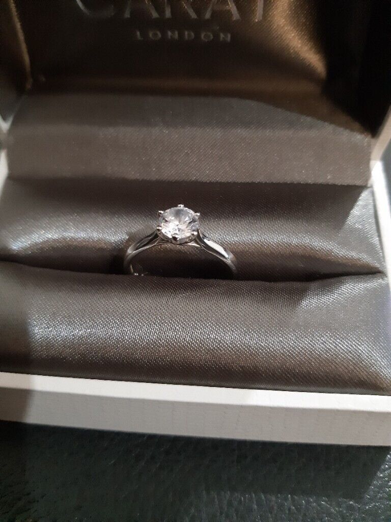 Premier Round Brilliant Trilogy Ring
